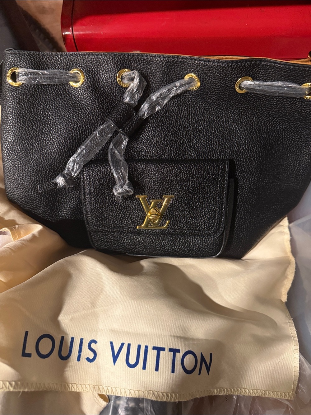 Louis Vuitton Black Pebbled Leather Drawstring Shoulder Bag with Gold Logo